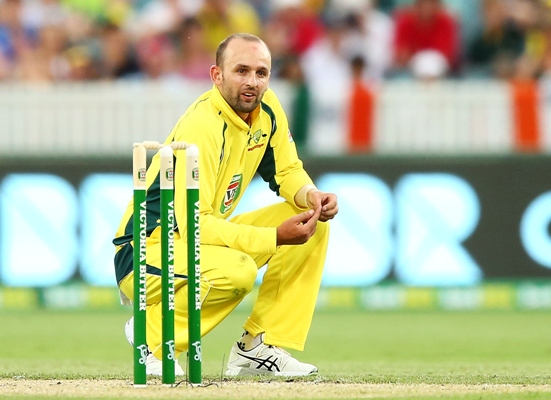 Nathan Lyon of Australia reacts after a delivery 