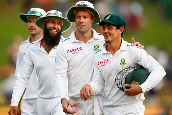 AB de Villiers of South Africa with teammates Hashim Amla and Quinton de Kock during the 4th Test in Centurion 