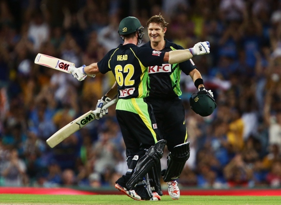 Shane Watson of Australia (right) celebrates with teammate Travis Head after scoring a century 