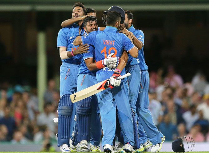 India players celebrate victory over Australia in the third Twenty20 international match at Sydney Cricket Ground on Sunday