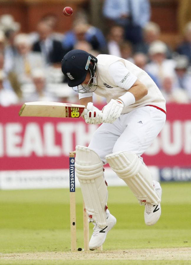 England's Joe Root takes evasive action 