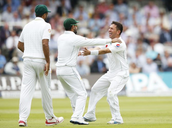 Pakistan's Yasir Shah celebrates after taking the wicket of England's Joe Root on Day 2 of the 1st Test at Lord's in London on Friday