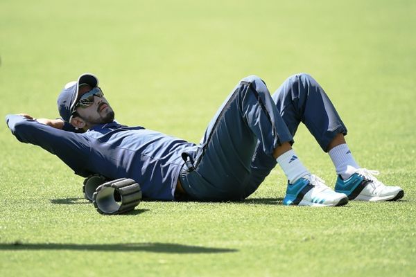 India's KL Rahul stretches during a training session