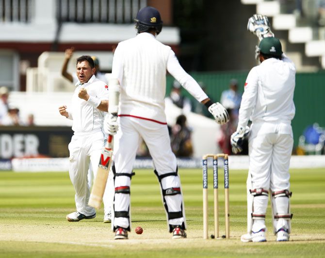Pakistan's Yasir Shah celebrates the wicket of England's Steven Finn on Day 3 of the first Test at Lord's on Saturday