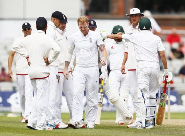 England's Ben Stokes goes off the field following a calf injury