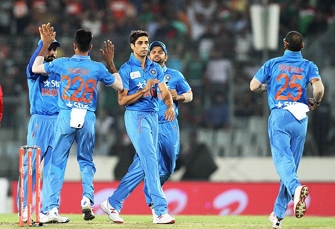 Indian players celebrate the wicket of Bangladesh player Soumya Sarkar