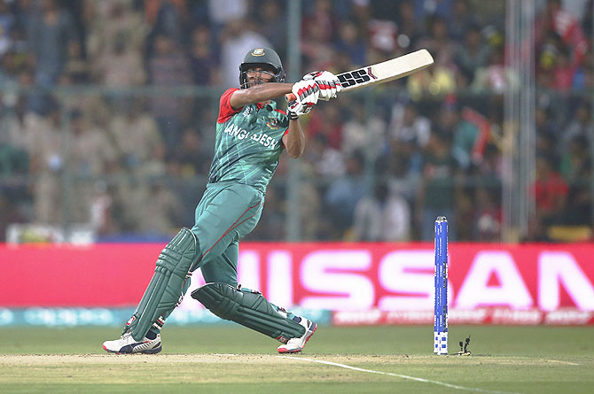 Bangladesh's Mahmudullah plays a big one against Australia during their ICC World Twenty20 Super 10s Group 2 match at M Chinnaswamy Stadium in Bengaluru on Monday