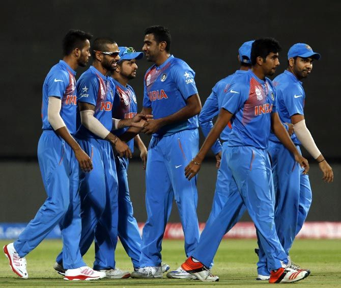 India players celebrate a Bangladesh wicket during their WT20 Super 10 match in Bangalore on Wednesday