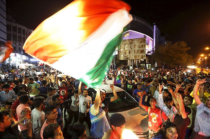  Fans celebrate after India beat Australia