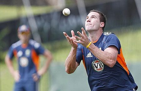 Australia's John Hastings catches a ball during a practice session