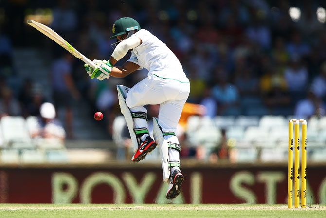 South Africa's Temba Bavuma is struck by a delivery from Australia's Josh Hazlewood