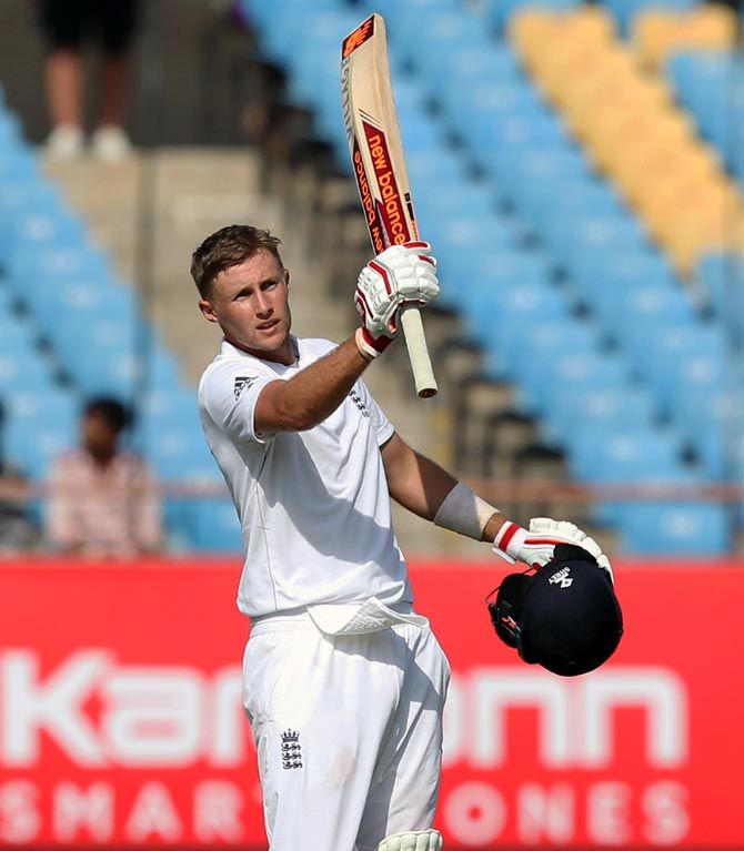 Joe Root celebrates after completing his century on Wednesday