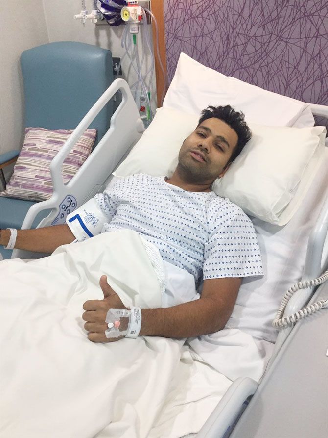 India cricketer Rohit Sharma gives a thumbs up following his surgery on Friday