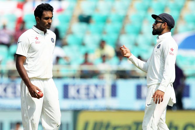 India's captain Virat Kohli speaks to Jayant Yadav on Day 3 of the 2nd Test in Vizag on Saturday