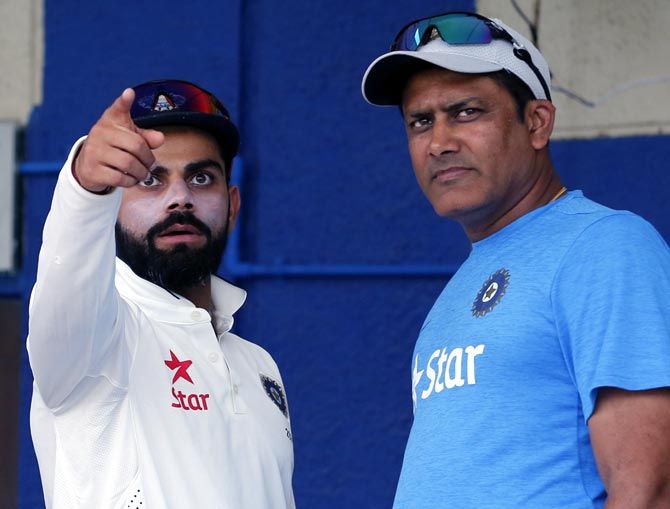India coach Anil Kumble, right, with captain Virat Kohli