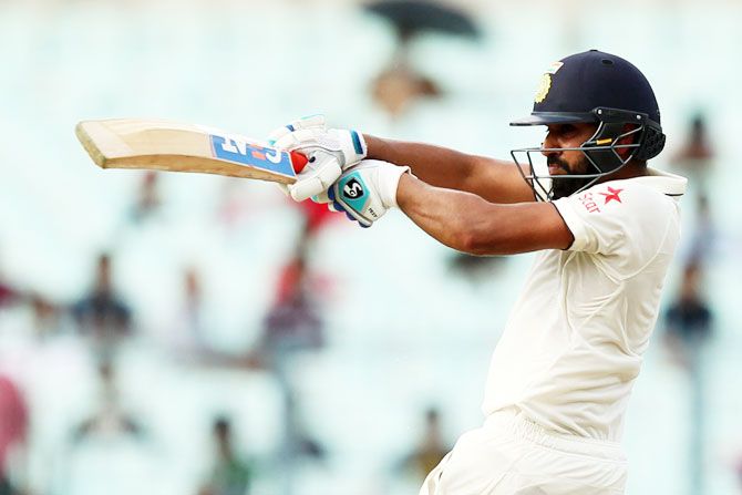  India's Rohit Sharma plays a pull shot on Day 3 