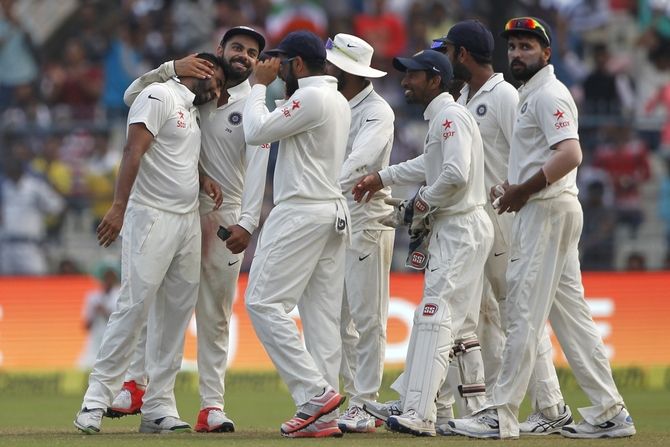 The Indian players celebrate a Kiwi wicket on Day 4 of the 2nd Test at the Eden Gardens in Kolkata, October 3, 2016. Photograph: BCCI