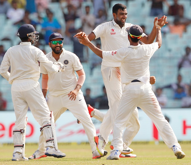 Ravichandran Ashwin of India celebrates the wicket of New Zealand’s captain Ross Taylor