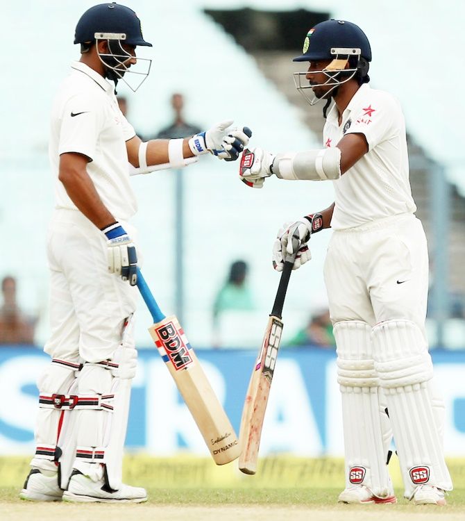 Mohammad Shami and Wriddhaman Saha of India during Day 4 of the second Test match at Eden Gardens on Monday