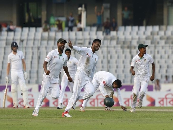 Bangladesh players celebrate victory against England on Sunday