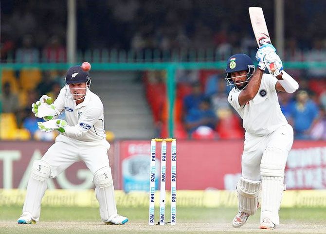 Cheteshwar Pujara bats during the first Test against New Zealand in Kanpur. Photograph: Danish Siddiqui/Reuters