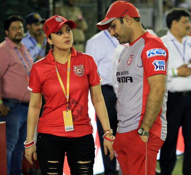 Kings XI Punjab director of cricket operations Virender Sehwag, right, with co-owner Preity Zinta
