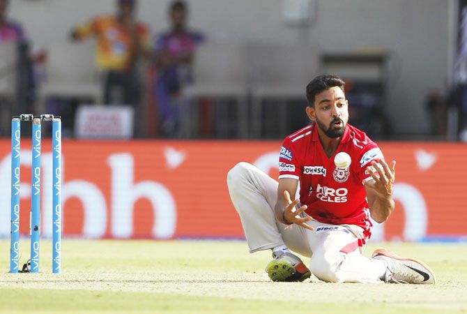 Punjab's Swapnil Singh nearly let-off Pune's Mahindra Singh Dhoni as he bobbled the ball in a caught and bowled effort. He eventually held on to the catch to see the back of MSD.