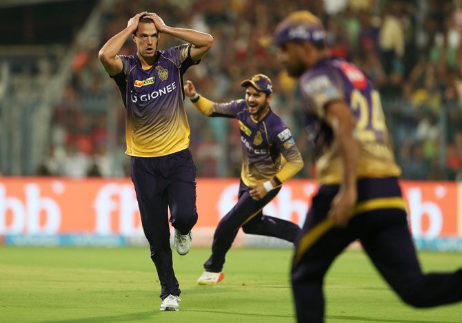 Kolkata Knight Riders' Nathan Coulter-Nile reacts as the catch is taken to dismiss Royal Challengers Bangalore's AB de Villiers