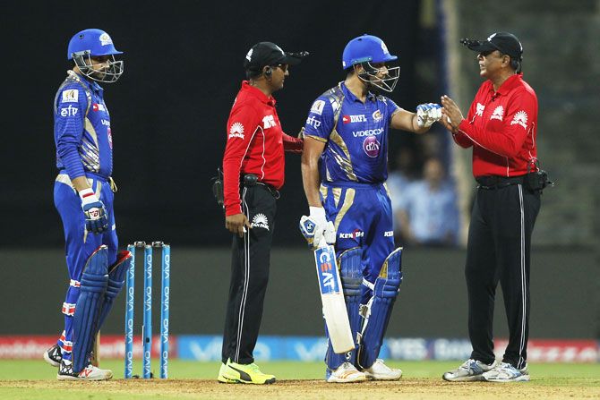 Mumbai Indians captain Rohit Sharma argues with umpires during the  Indian Premier League match against the Rising Pune Supergiant at the Wankhede Stadium in Mumbai, on Monday
