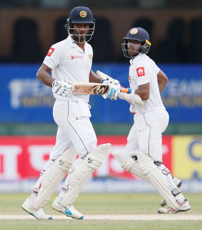 Sri Lanka's Kusal Mendis and Dimuth Karunaratne run between wickets Sri Lanka's Kusal Mendis and Dimuth Karunaratne run between wickets during their 100-run 2nd wicket partnership