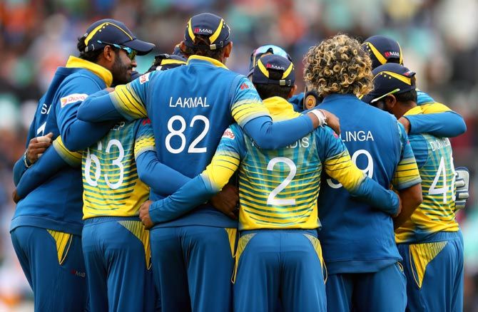 The Sri Lankan team in a huddle