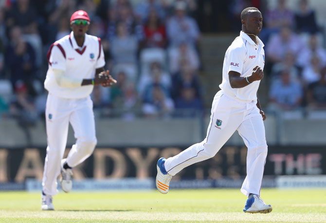 West Indies' Kemar Roach celebrates after dismissing England's Mark Stoneman