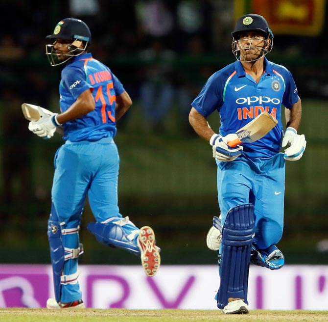 Bhuvneshwar Kumar, left, and Mahendra Singh Dhoni refused to be daunted by the prospect of defeat, India versus Sri Lanka, August 24, 2017. Photograph: Dinuka Liyanawatte/Reuters