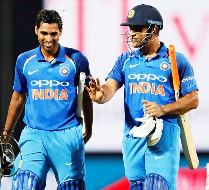 MS Dhoni and Bhuvneshwar Kumar chat after taking India across the finish line in the 2nd ODI against Sri Lanka on Thursday