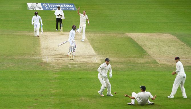 West Indies' Shai Hope gets a breather as he is dropped by Alastair Cook off the bowling of Stuart Broad