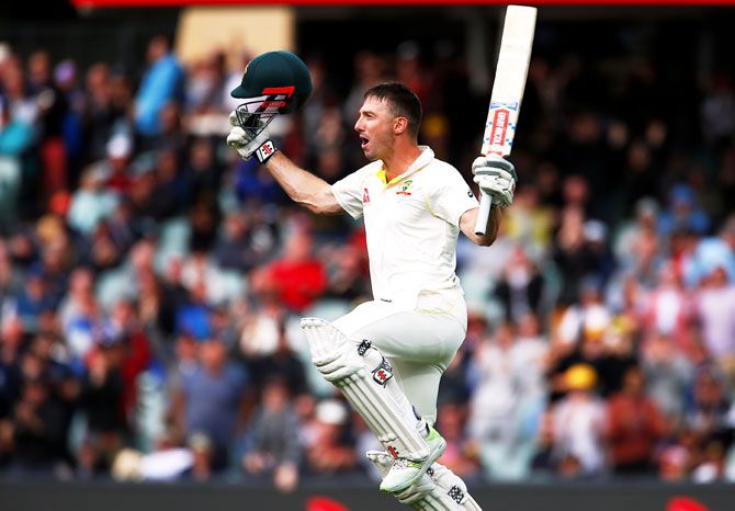 Australia's Shaun Marsh celebrates after reaching his century