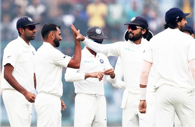 India's Mohammad Shami celebrates the wicket of Sri Lanka's Dimuth Karunaratne
