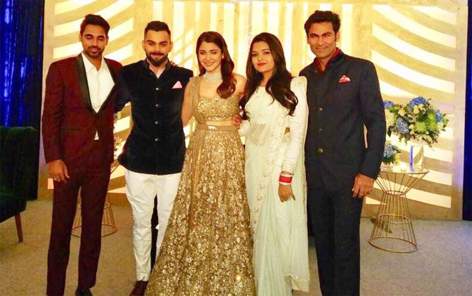 Former India cricketer Mohammad Kaif (right) was one of the invitees for the big wedding