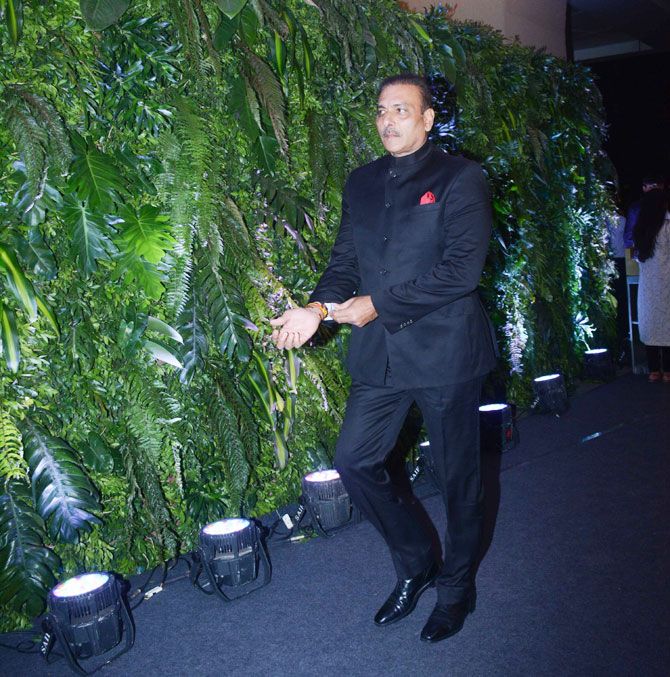 Ravi Shastri looks sharp as arrives at the reception