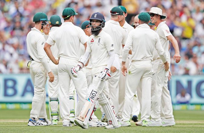 England's Moeen Ali leaves the field after being dismissed by Australia's Nathan Lyon
