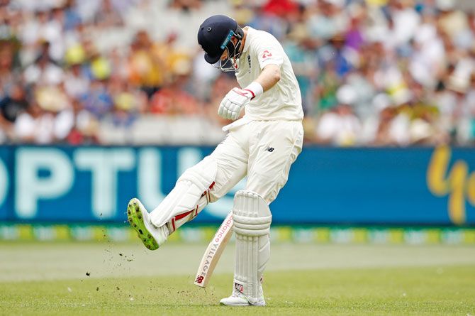 Joe Root kicks the ground in frustration after his dismissal