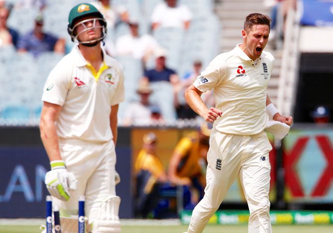 England's Chris Woakes reacts after bowling Australia's Cameron Bancroft
