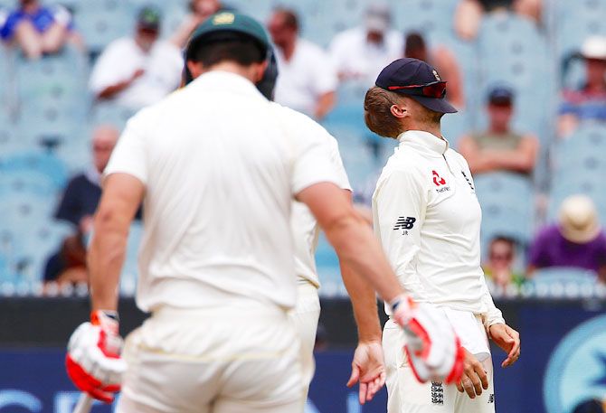 England's captain Joe Root reacts after nearly dismissing Australia's Mitchell Marsh