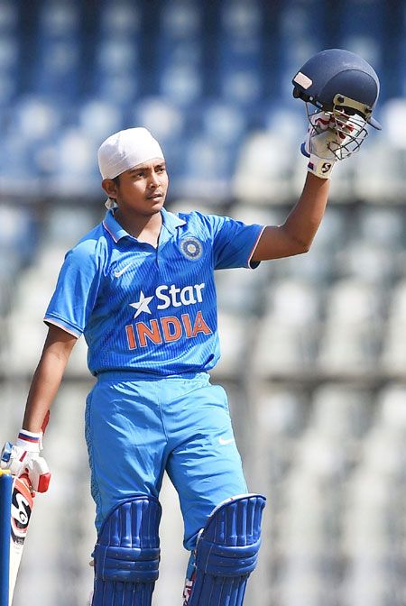 India Under-19 player Prithvi Shaw celebrates his century against England U-19 in Mumbai on Monday