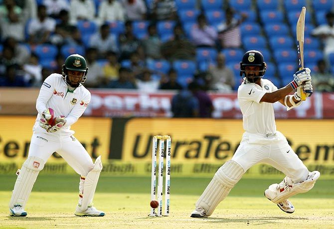 Ajinkya Rahane plays a cut short during his innings of 45 not out