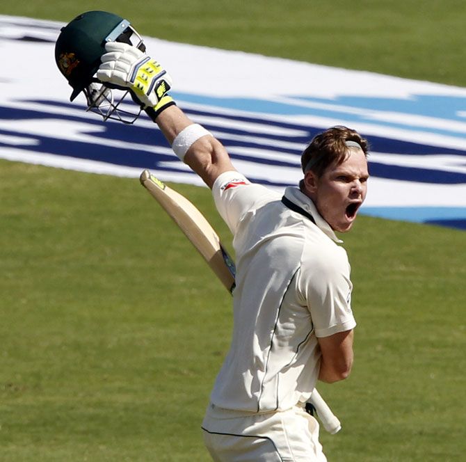 Australia captain Steve Smith celebrates his century in the Pune Test