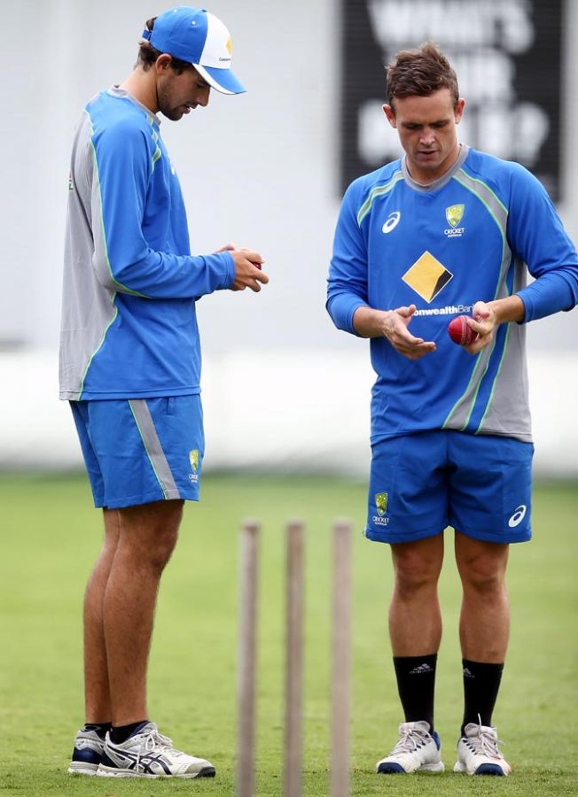 Ashton Agar, left, and Steve O'Keefe prepare to bowl during an Australian training session