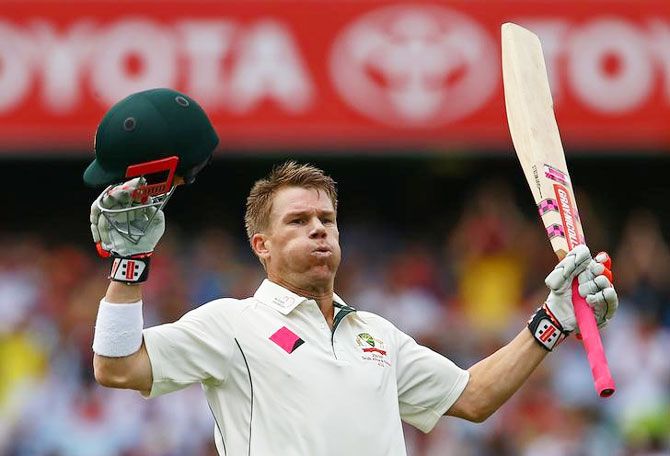 Australia's David Warner celebrates after reaching his century against Pakistan on Day 1 of the 3rd Test at the SCG on Tuesday