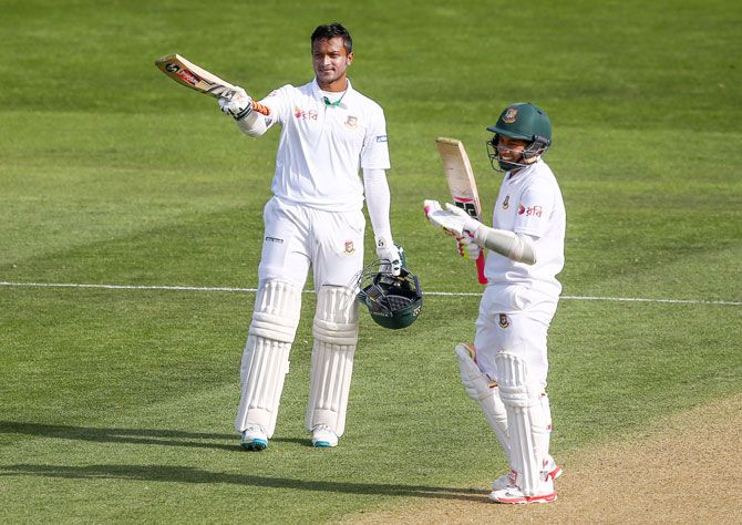 Bangladesh's Shakib Al Hasan celebrates his double century with teammate Mushfiqur Rahim during Day 2 of the first Test match against New Zealand at Basin Reserve in Wellington on Friday