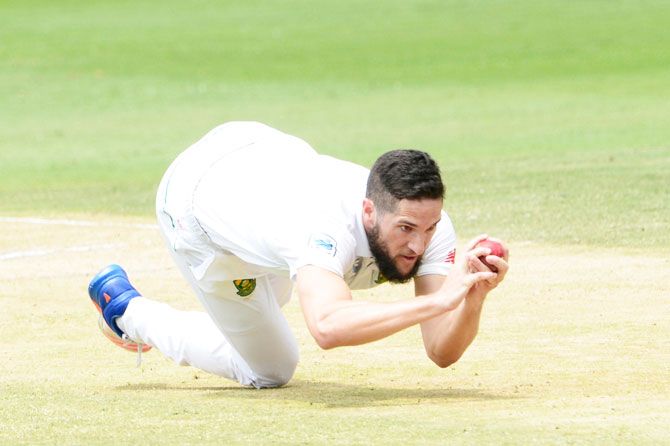 South Africa's Wayne Parnell dives forward to take a catch for the wicket of Sri Lanka's Nuwan Pradeep